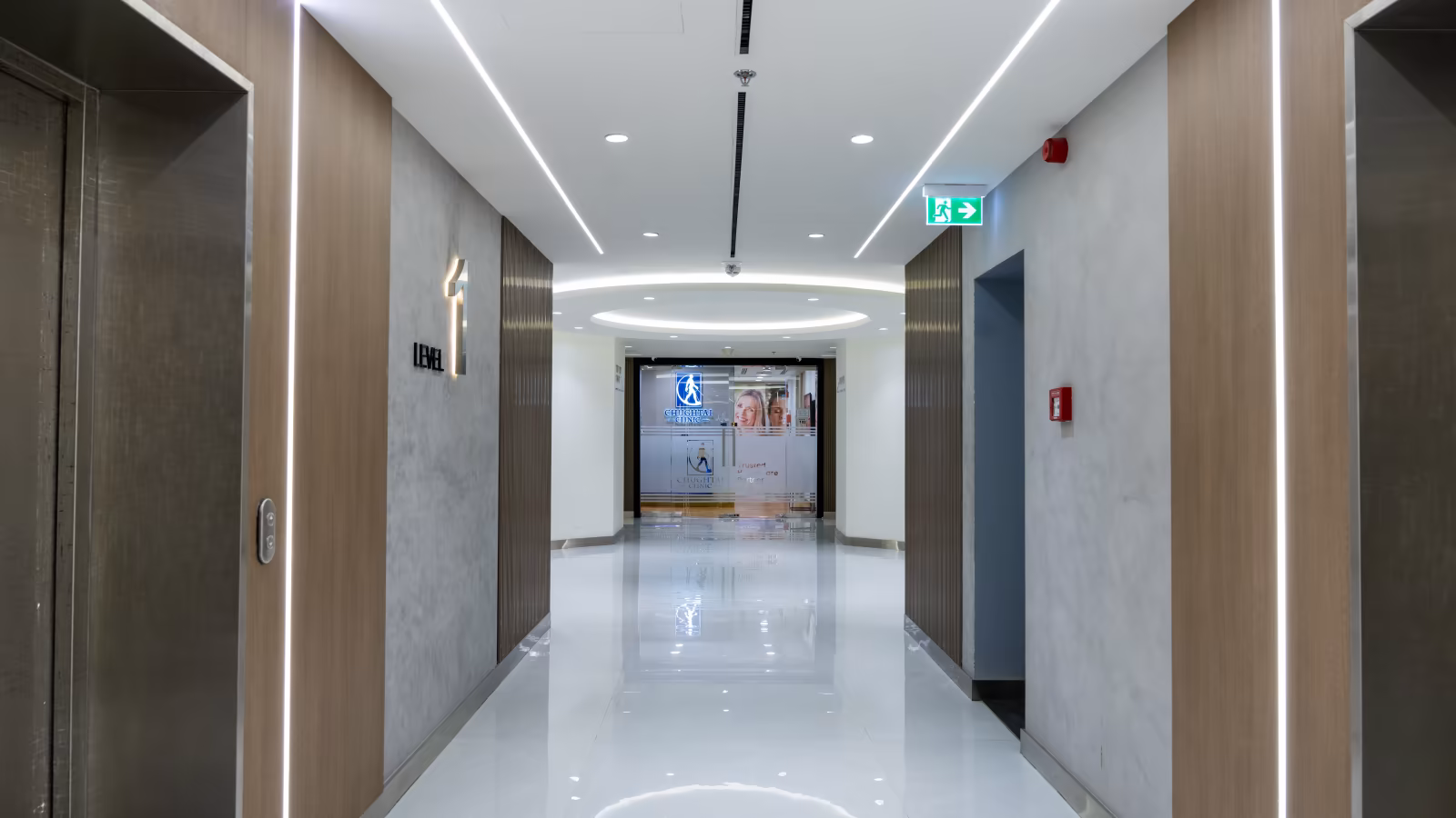 Bright corridor leading to the Chughtai Clinic entrance in Dubai Healthcare City